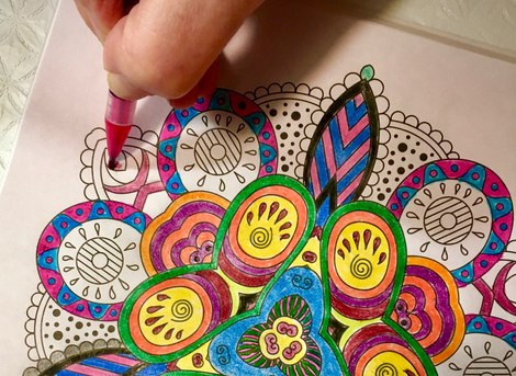 colouring mandala with coloured pencils