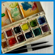 watercolour palette and brushes