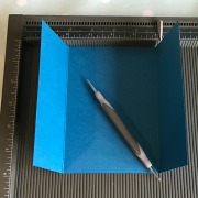 Scoring lines on the card base of a gate fold card. Scoring lines on the card base of a gate fold card.